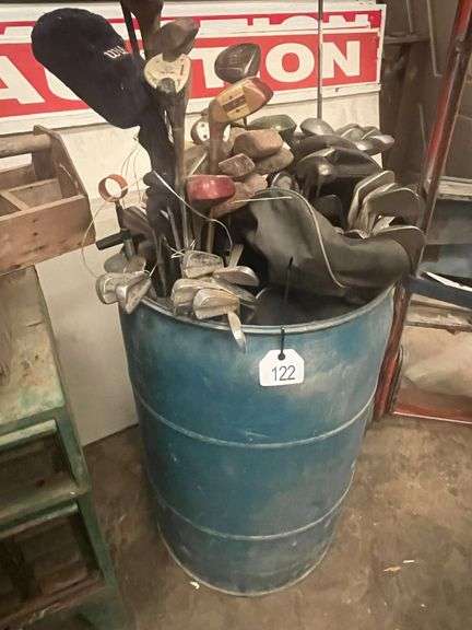 Drum Full of Golf Clubs image