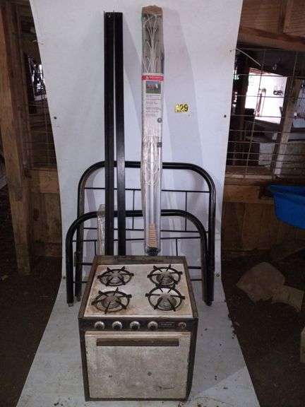 Twin Bed Frame, Clothesline, Gas Stove image