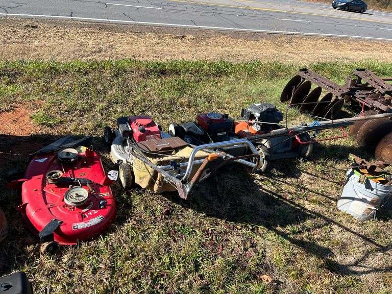 Three Push Lawnmowers image