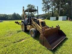 New Holland 655E Backhoe - Clamshell bucket - Walker Co Water & Sewerage Surplus