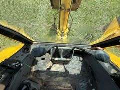 New Holland LB75B - Clam shell front bucket, Extend-a-hoe, 4 x 4, Cab, 5286 hrs, 36" back bucket