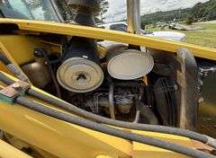 New Holland LB75B - Clam shell front bucket, Extend-a-hoe, 4 x 4, Cab, 5286 hrs, 36" back bucket