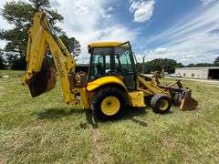 New Holland LB75B - Clam shell front bucket, Extend-a-hoe, 4 x 4, Cab, 5286 hrs, 36" back bucket