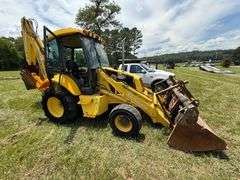 New Holland LB75B - Clam shell front bucket, Extend-a-hoe, 4 x 4, Cab, 5286 hrs, 36" back bucket