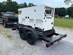 2002 CAT XQ75 KW Generator - Perkins diesel motor, 5281 hours, Electric start, Mounted on 2 axle trailer