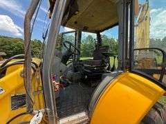 New Holland LB75B - Clam shell front bucket, Extend-a-hoe, 4 x 4, Cab, 5286 hrs, 36" back bucket