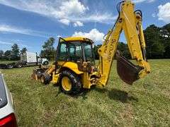 New Holland LB75B - Clam shell front bucket, Extend-a-hoe, 4 x 4, Cab, 5286 hrs, 36" back bucket