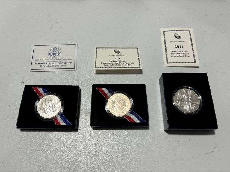 2011 American Eagle 1 Ounce Silver Uncirculated Coin, 2011 Medal of Honor Commemorative Coin Program Uncirculated Silver Dollar, 2002 United States Military Academy Bicentennial Commemorative Coin image