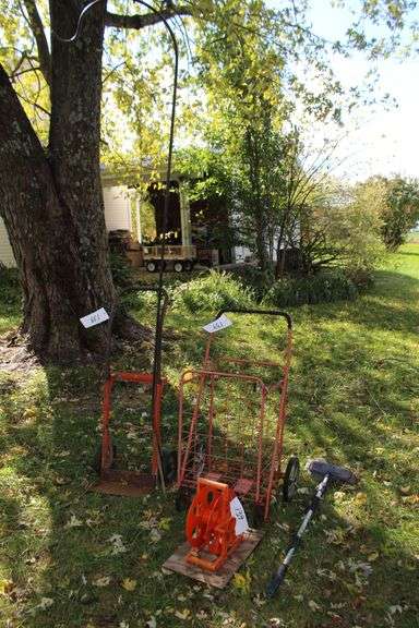 Shepherd's Hook, Dolly Cart, Folding Hamper Basket, Cord Reel, and Brush image
