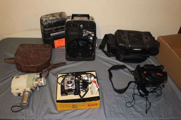 Ambico Camera Bag, Brownie Twin 20 Outfit Camera, Minolta Zoom 8 Camera and Bag, and Bell & Howell Projector Reel image