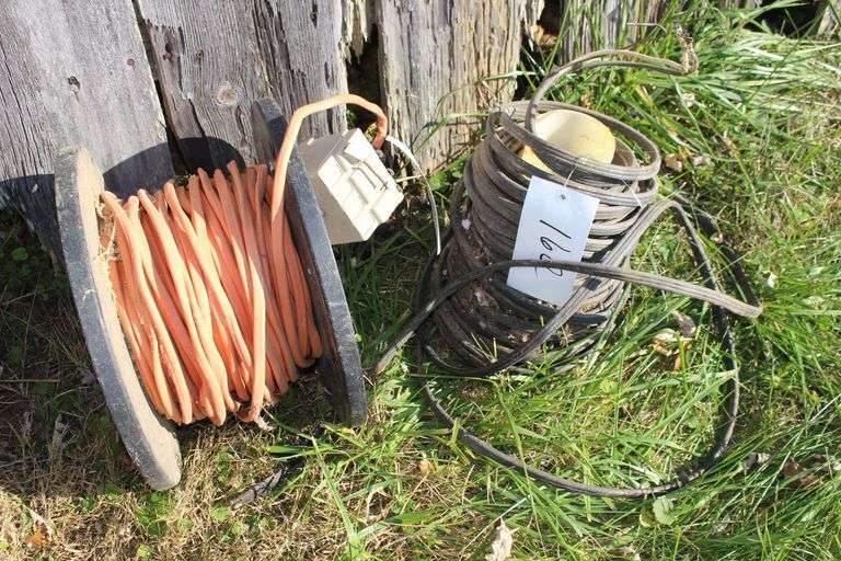 Roll of Electrical Cord with Outlet and Plug and Roll of NM-B 600 V Electrical Wire image