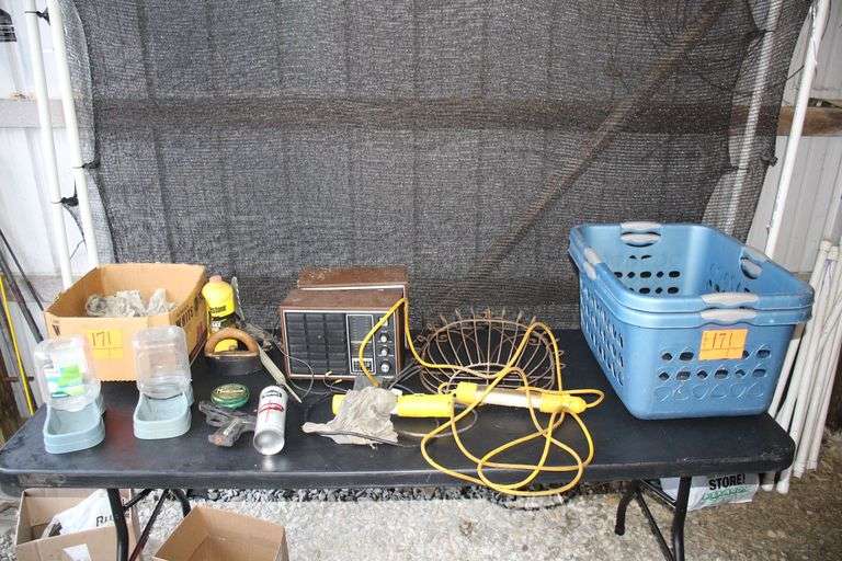 (2) Gravity Waterers, Hanging Lights, (2) Laundry Baskets, Cast Iron with Handle, and Misc image