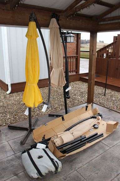 (2) Umbrella Stands and (3) Umbrellas image