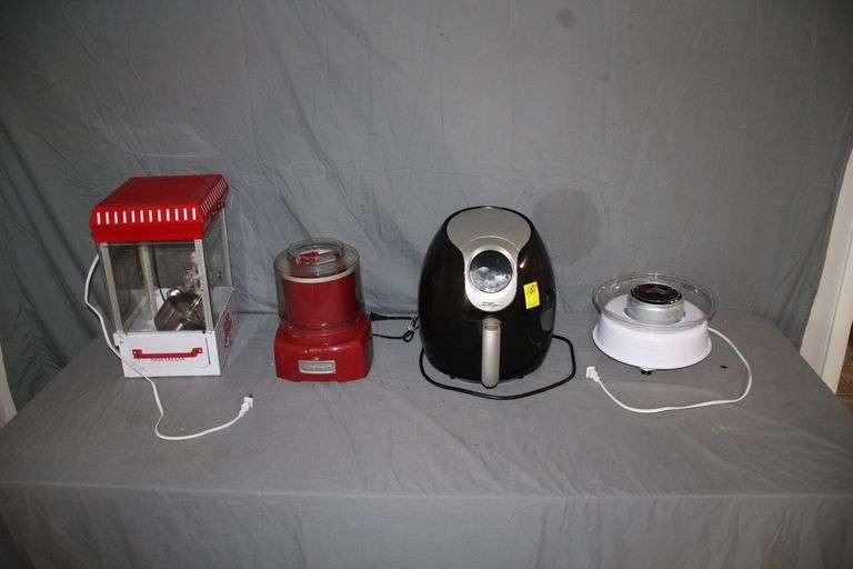 Nostalgia Popcorn Machine, Air Fryer, Nostalgia Cotton Candy Maker, and Cuisinart Ice Cream Yogurt Maker image