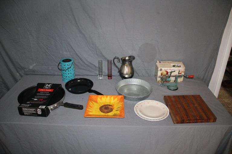 Skillets, Plates, Pitcher, Apple Master, and Cutting Board image