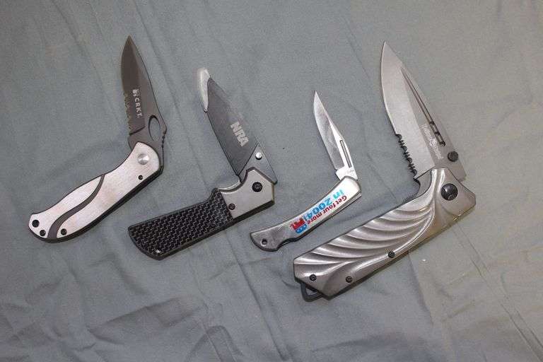 CRKT Locking Single Blade Pocket Knife, NRA Locking Single Blade Pocket Knife, "Get Four More" Lock Back Single Blade Pocket Knife, and Hoffman Richter Locking Single Blade Pocket Knife image
