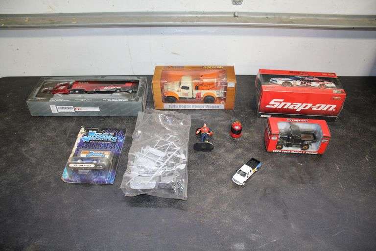 Snap-On 1925 Ford Model T Pickup 1/32 Scale, Snap-On Championship Series NASCAR Car, ERTL Collectibles 1946 Dodge Power Wagon 1/25 Scale, Model Car Parts, and Muscle Machines 1969 Chevelle 1/64 Scale image