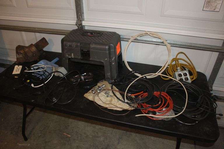 Hollands Erie 3.5 in Jaw Bench Vise, Rubbermaid Step Tool Box with Tray, Lug Nuts, Electrical Cords, and Dust Pan image