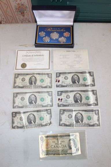 A Year to Remember Coin Set from 2000, (6) 2 Dollar Bills, and Canadian Dollar image