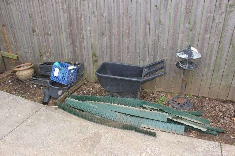 Plastic Wheelbarrow, Flower Pots, Planters, Landscaping Trim, and Bird Feeder image