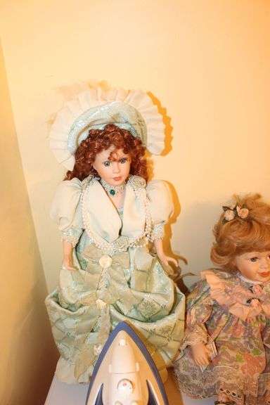 Jeanie Rub Massager, Electric Iron, Porcelain Dolls, Decorative Plates, Candy Dish, Figurines, Kewpie Doll, and Misc.