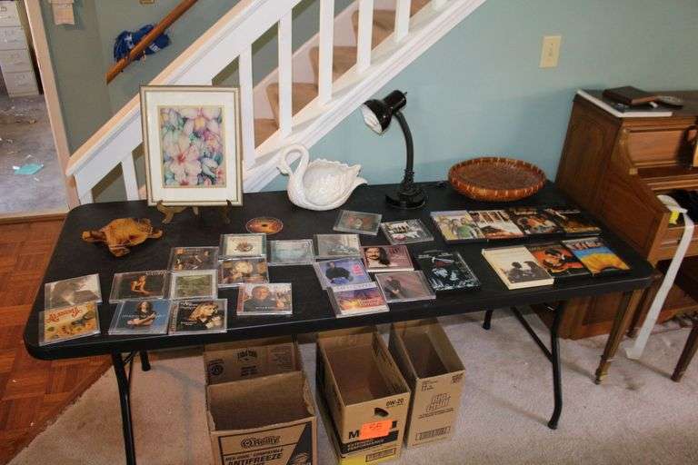 Desk Lamp, Swan Decorative Figurine Bowl, Wooden Turtle, Electric Cords, Wicker Baskets, CDs, DVDs, and Misc. image
