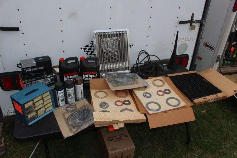 Texaco Antifreeze Coolant, Bolt Bin, Black and Decker Air Station Compressor, Dacron Heater, Electrical Cord, Funnel, Radiator, and Automatic Transmission Parts image