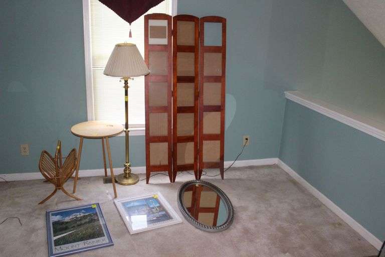 Magazine Rack, Standing Lamp, Oval Shaped Mirror, and (2) Framed Pictures, Circular Table, and Folding Picture Frame Stand image