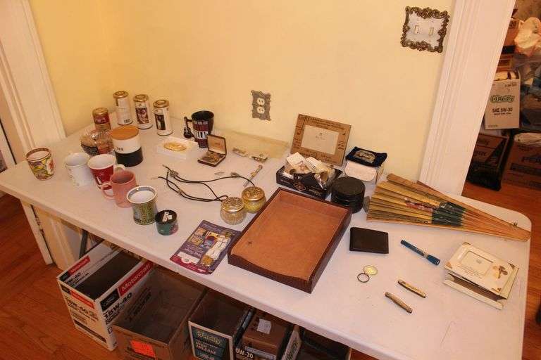 Tie Pins, Coffee Mugs, Tire Gauge, Bolo Ties, Tie Clips, Decorative Fans, Belt Buckle, Pocket Knives, and Misc. image