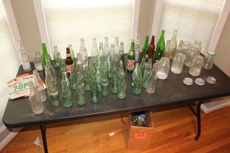 Assortment of Glass Bottles and Jars image