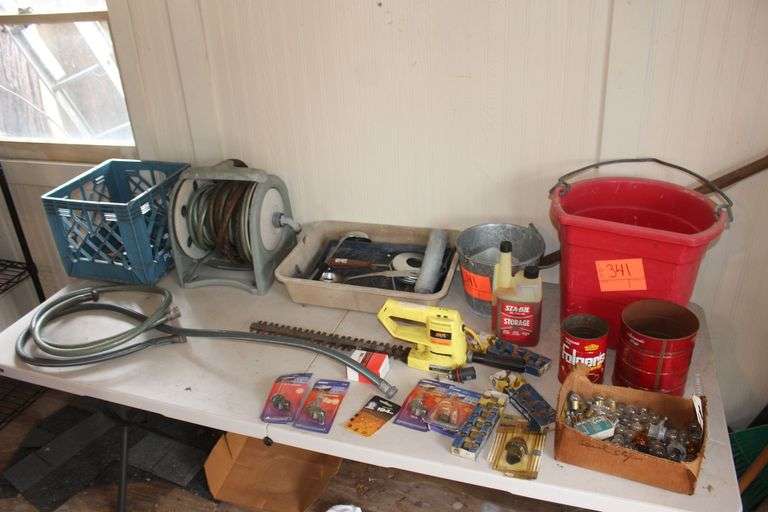 Bucket, Water Hose, Trimmer, Bulbs, Nails, and Misc. image