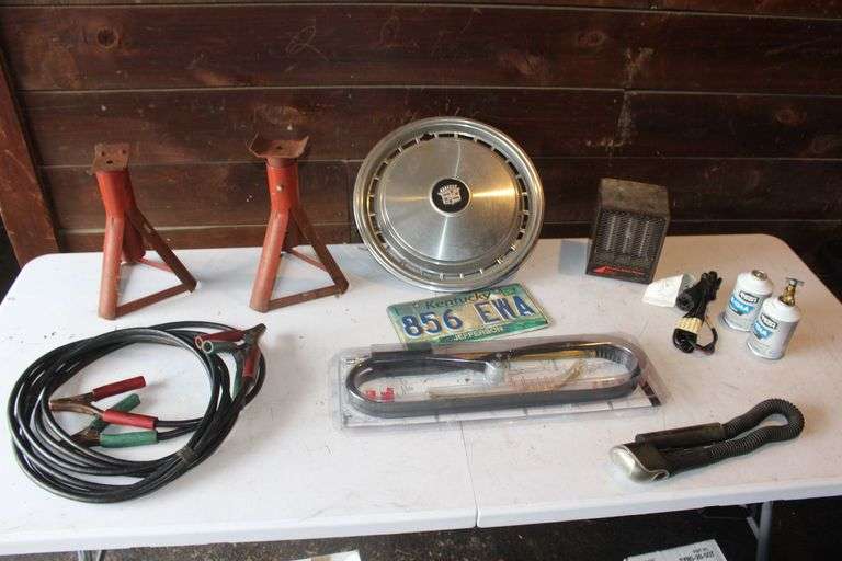 (2) Jack Stands, Jumper Cables, Kentucky License Plate, Cadillac Hub Cap, Electric Heater, Slide Sprayer, Light, and Misc. image