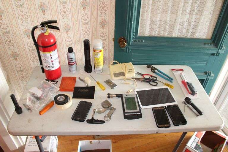 Fire Extinguisher, Soldering Iron, Channel Locks, Flashlights, Samsung Phones, Tape Measures, AAA Batteries, and Misc. image