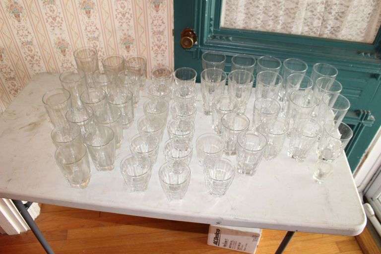 Various Sized Glasses and Shot Glass image