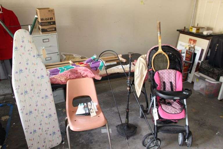 Brunswick Chair, Wooden Crutches, Ironing Board, Iron, Umbrellas, Graco Stroller (2) Shepherds Hooks, and Spalding Tennis Racket image
