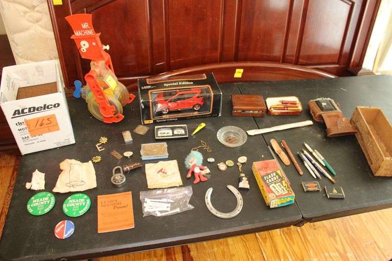 Maisto Mercedes Benz's A Class 1:18, Mr Machine Wind Up Toy, Shirt Buttons, Marbles, Wooden Brookshire Cheese Box, Casino Aztar Ashtray, (2) Brother Lite Lighters, and Misc. image