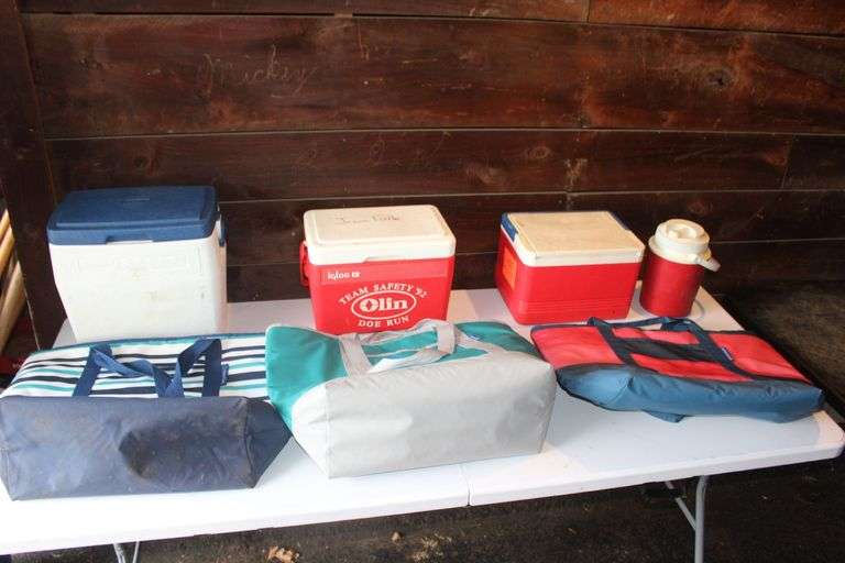 Coleman cooler, (2) igloo coolers, cooler bags, and water jug image