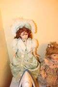 Jeanie Rub Massager, Electric Iron, Porcelain Dolls, Decorative Plates, Candy Dish, Figurines, Kewpie Doll, and Misc.