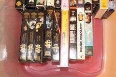 1 Way VHS Rewinder and Misc VHS and DVD Movies