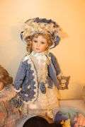 Jeanie Rub Massager, Electric Iron, Porcelain Dolls, Decorative Plates, Candy Dish, Figurines, Kewpie Doll, and Misc.