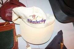 Ciao! Garment Bag, Samsonite Suitcase, Hand Bag, Dooney and Bourke Purse, Kentucky Derby Hats, and Misc.