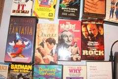 1 Way VHS Rewinder and Misc VHS and DVD Movies