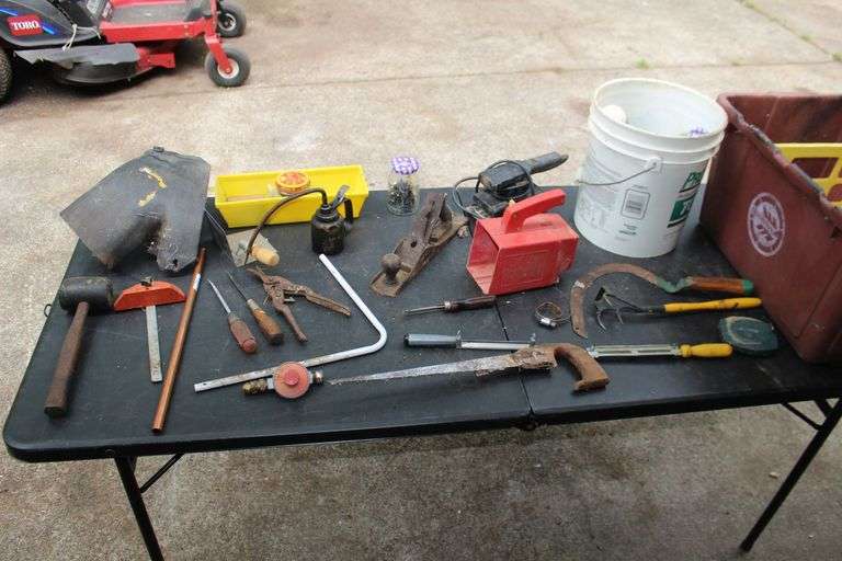 Grease Can, Hand Saws, Mallet, Black and Decker Sander, Screwdrivers, Hand Planer, Nails, 100 Ft. Stanley Tape Measure, and Misc. image