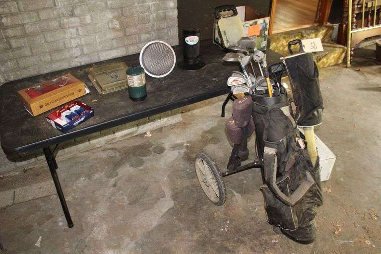 Knight Driver, Judge Woods, Dunlop and Daiwa Irons, Golf Bag and Cart, Golf Balls, and Coleman Golf Cat Heater image