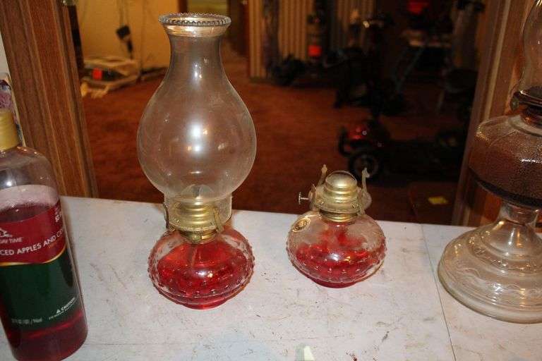 (2) Oil Lamps with Globes, Oil Lamp Base, (3) Rollers, Lamp Oil, Iron, Glass Goblet, and Wooden Calendar