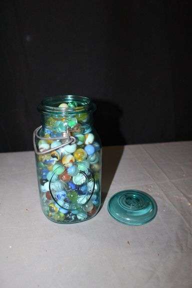 Full Jar of Various Sized Marbles image