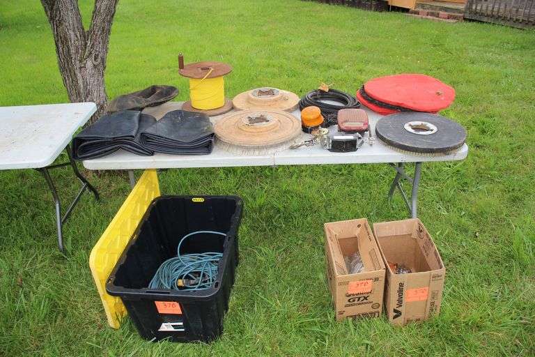 Pieces to a Ratchet Come-Along, 20 Inch Buffer Pads, V Belt, Inner Tubes, (3) Floor Brushes, Electrical Cord, Spool of Rope, Break and Caution Lights, and Misc image