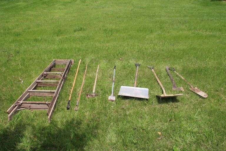 6 Ft Step Ladder, (2) Mop Handles, (2) Scoop Shovels, Spade Shovel, Axe, Scraper, and Gardening Tool image
