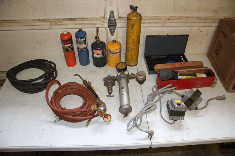 Acetylene Hose with Brazing Tip, Coleman and Craftsman 16.4 Propane Tanks, Water Strainer for Air Compressor, Antifreeze Thermometer, and Misc image