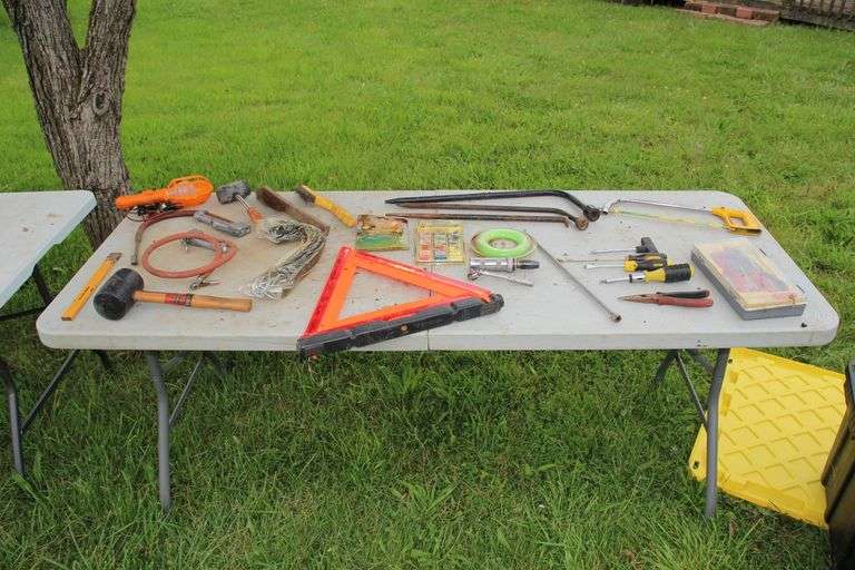 Tire Tools, Foldable Caution Lights, Rubber Mallet, Screwdrivers, (2) Air Hose Attachments, Wire Brushes, Bungee Cords, and Misc image